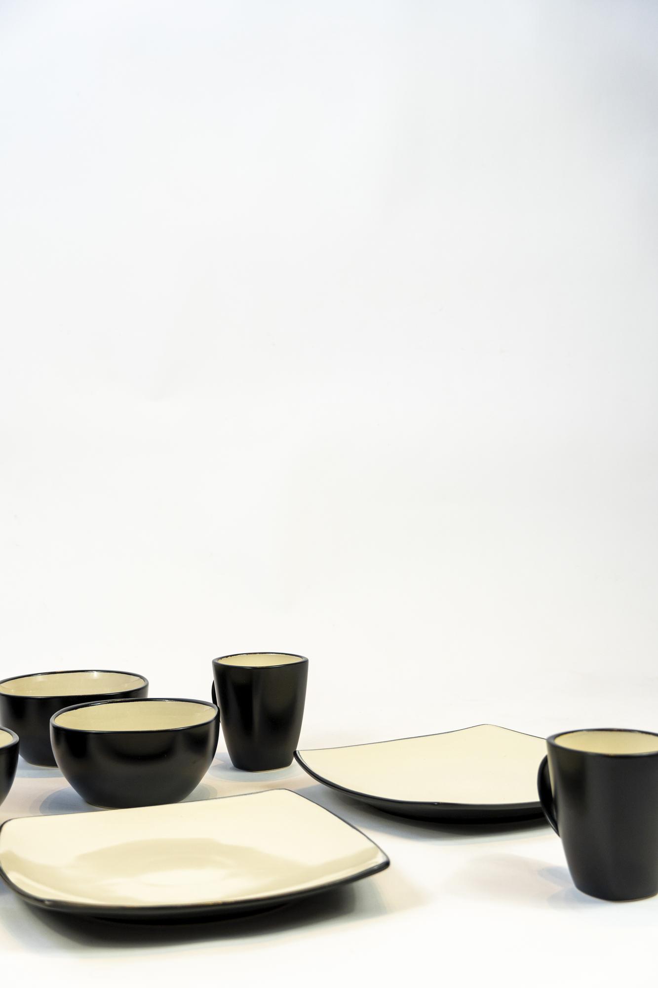 Assorted tasting plates on a reflective surface